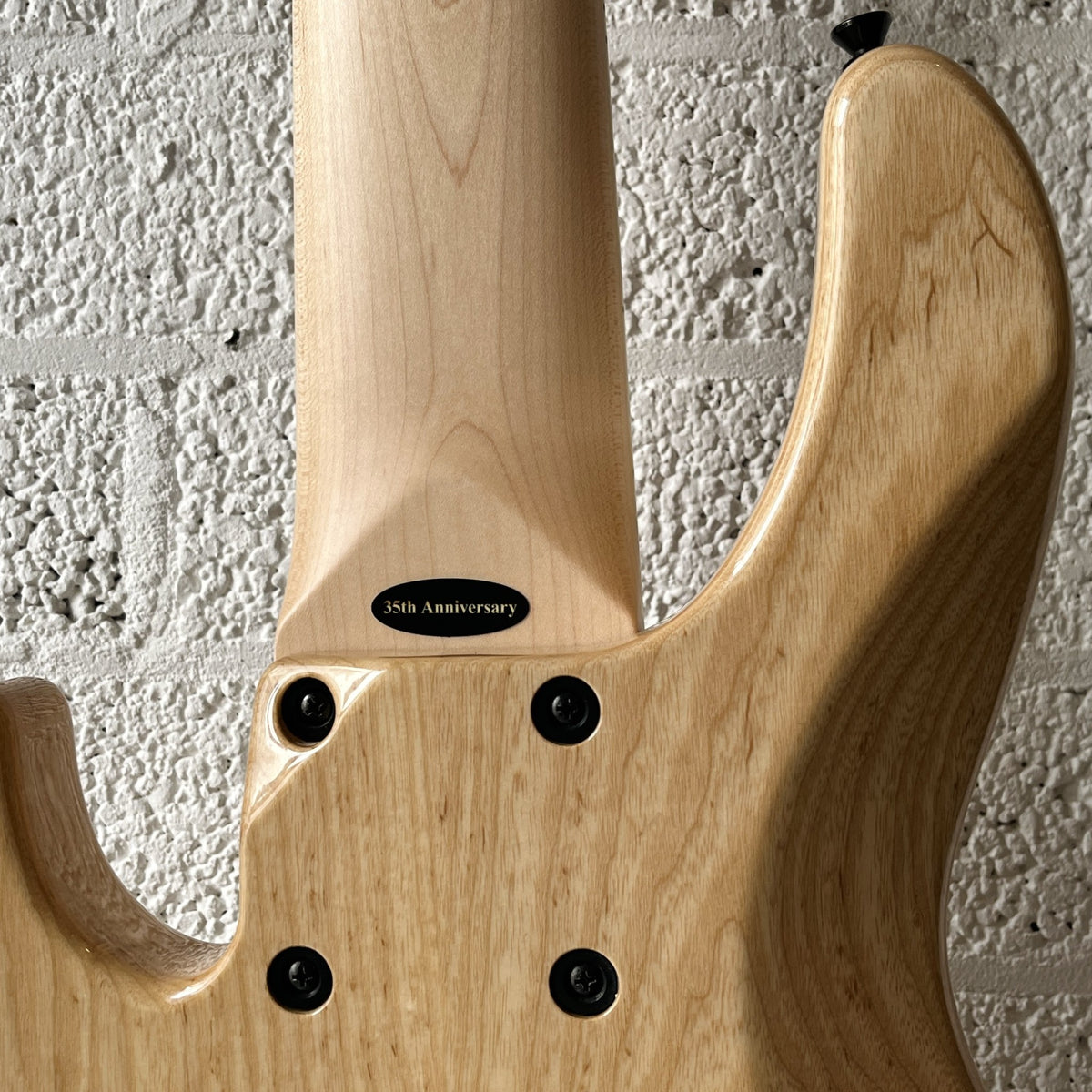 Atelier Z Beta6 6-string bass in Natural finish with black hardware neck joint