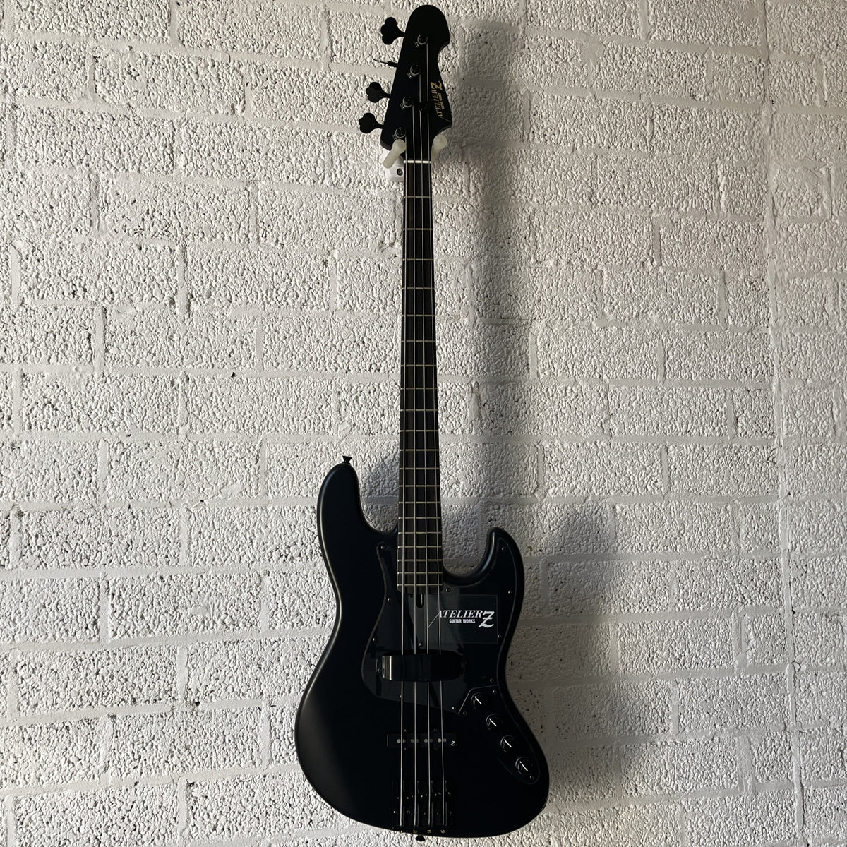 Atelier Z M#245 Custom 4-string bass in Matt Black with matching headstock and black hardware