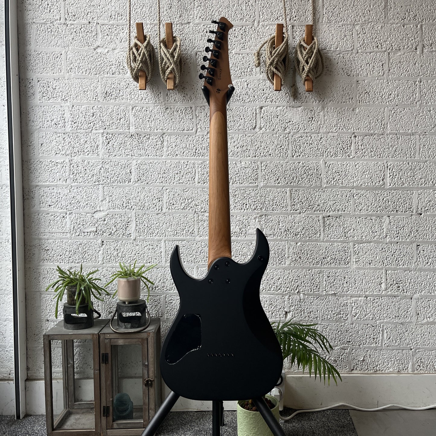 spira s-407 satin black 7-string electric guitar back view