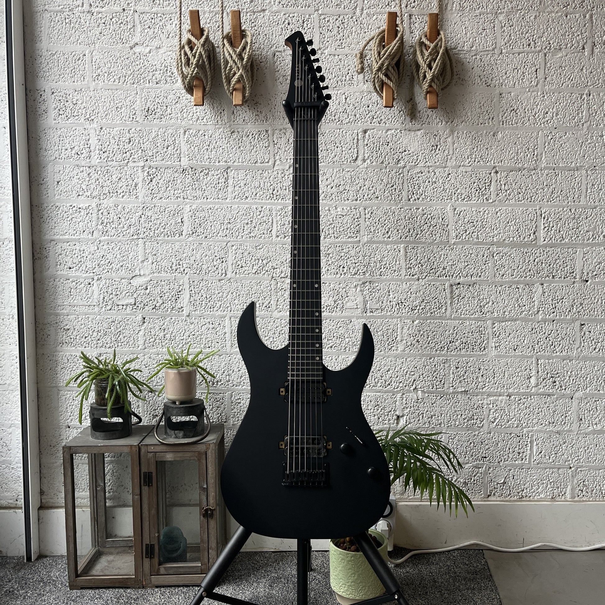 spira s-407 satin black 7-string electric guitar front view