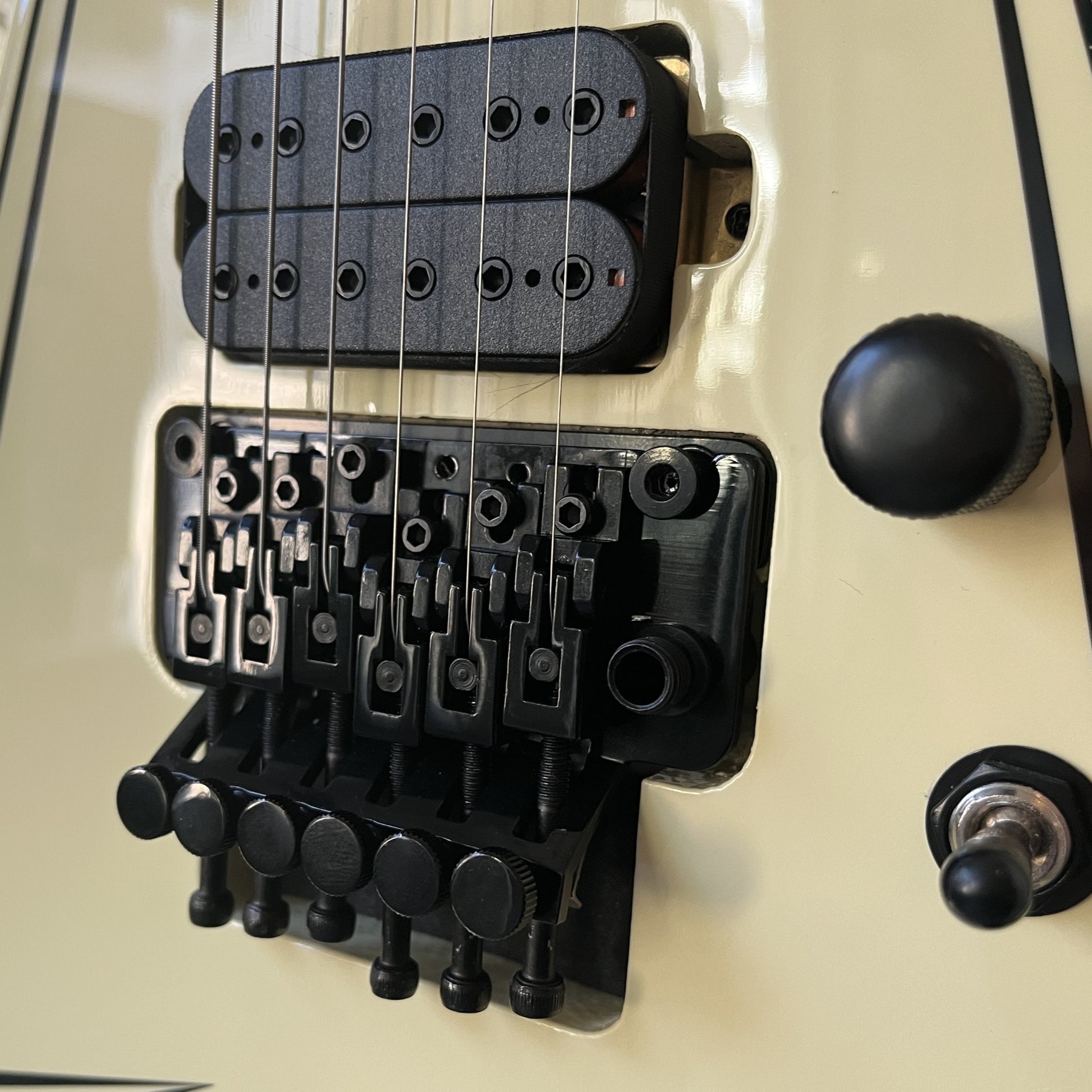 spira v420 flying v antique white electric guitar bridge